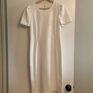 White straight dress, perfect for brides.